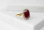 Front shot of ruby gemstone ring with halo of diamonds for festive wear - Vansh Diamonds