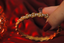 Side shot of twisted gold bangle with Natural  – modern elegance - Vansh Diamonds