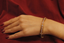 Hand shot of timeless 18K gold diamond bangles – Vansh Diamonds