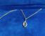 Pendant view of elegant diamond pendant set with matching earrings in 18K gold- Vansh Diamonds