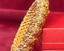 Zoomed in shot of handcrafted 22k Gold Kadda (bangle) with intricate gold designs