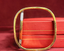 Zoomed in of square 18k gold & Natural bangle with a sleek, polished finish and diamonds on the sides - Vansh Diamonds