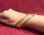 Square 18k gold & Natural bangle with a sleek, polished finish and diamonds on the corners - Vansh Diamonds