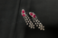 Top shot of earrings of lab grown diamond necklace with ruby stones - Vansh Diamonds